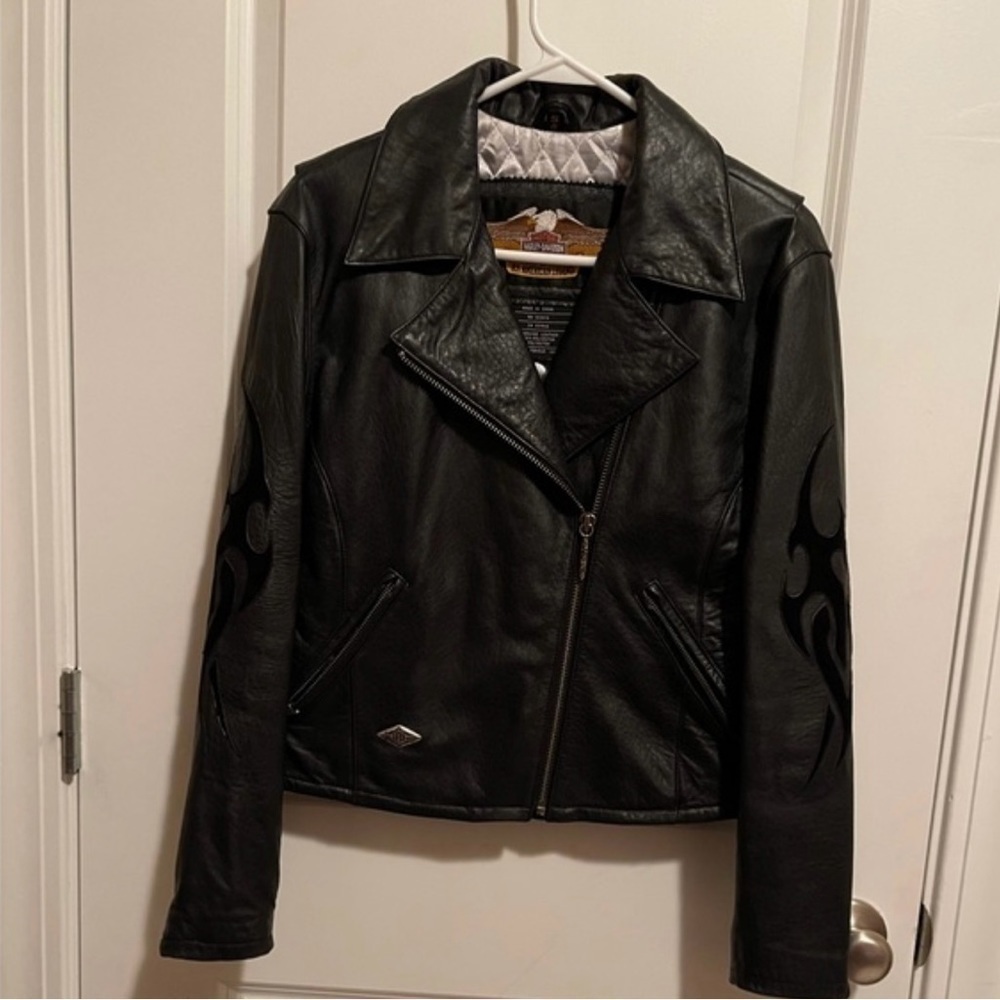 Harley Davidson womans leather riding jacket.  Size  Medium  Flames on sleeves.